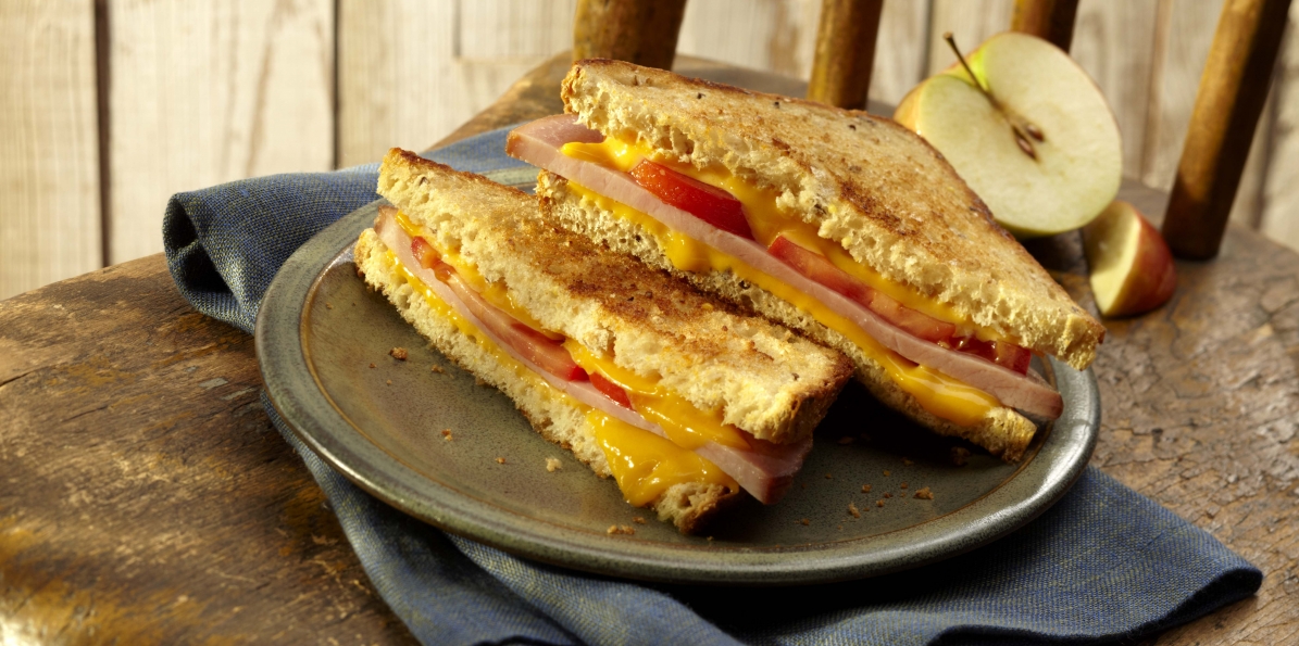 How to use a HoneyBaked coupon Harry J. Hoenselaar created in Honey Baked Ham Company store in Michigan. He’d choose the optimum quality bone-in ham. He also found a way to slice the ham into entirely even slices.